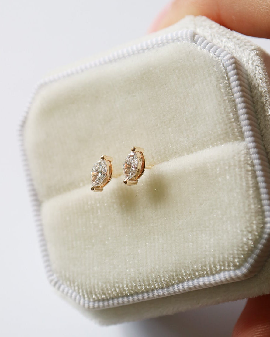 Solid 9k gold and diamond marquise stud earrings in white velvet box
