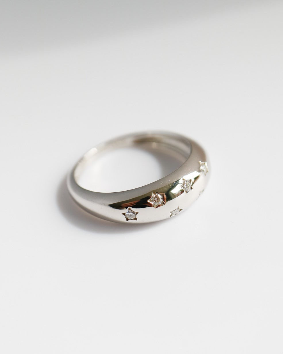 Silver ring on a white background