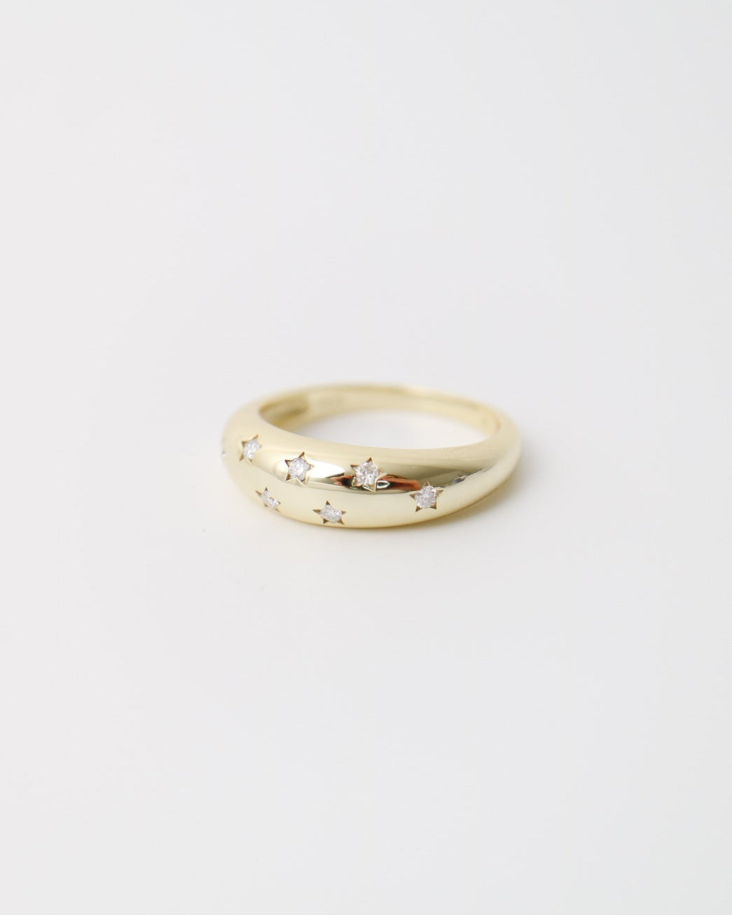 Gold ring on a white background