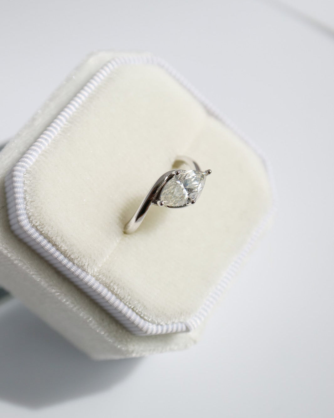 Sterling silver marquise moissanite wrap ring with brilliant sparkle