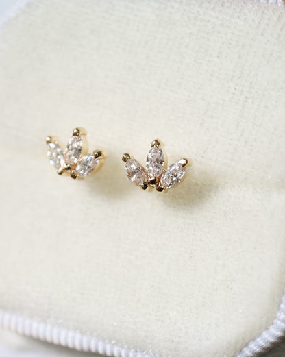 Stud Earrings in 9ct gold with 6 marquise diamonds close up