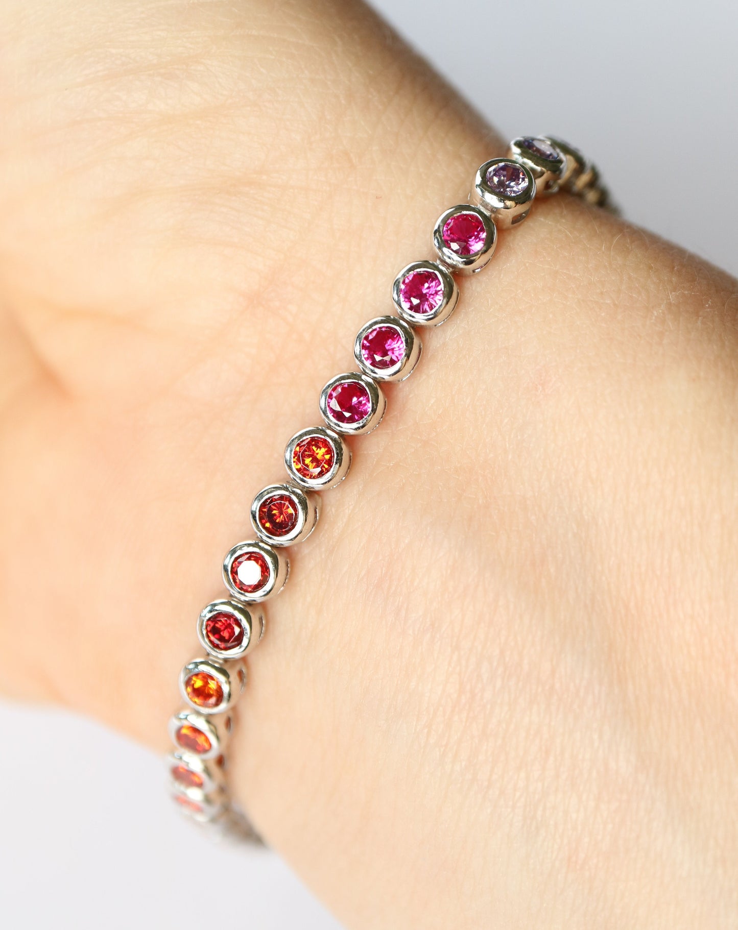 Rainbow coloured tennis bracelet in sterling silver