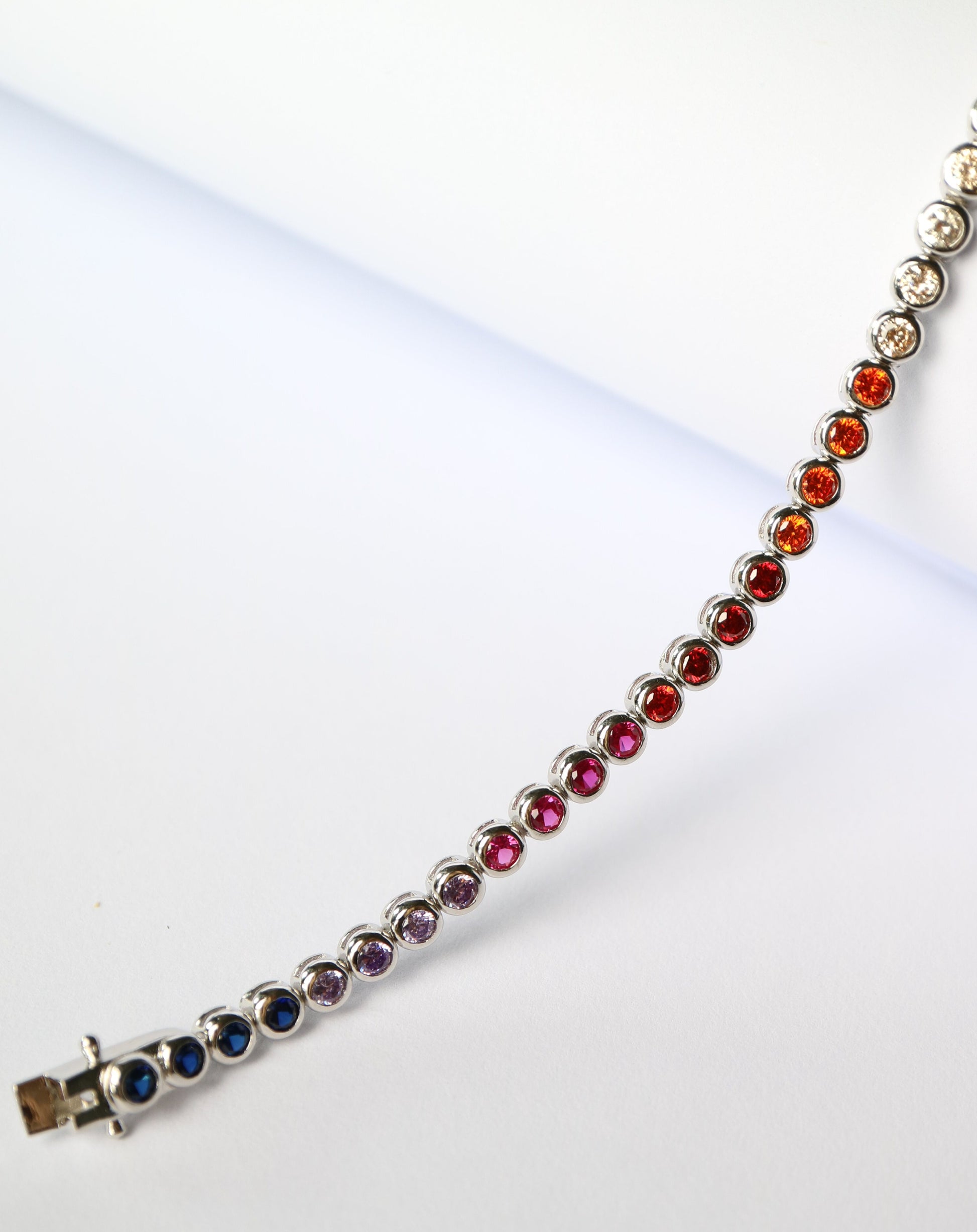Rainbow coloured tennis bracelet in sterling silver