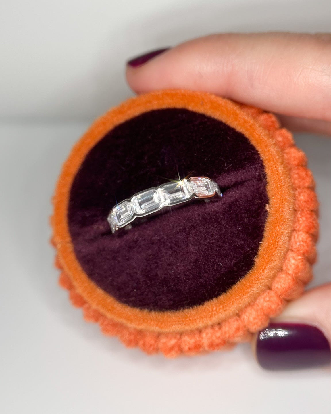 Prism Eternity Band in sterling silver featuring emerald-cut moissanite stones in a full eternity design from Collective & Co. Jewellery