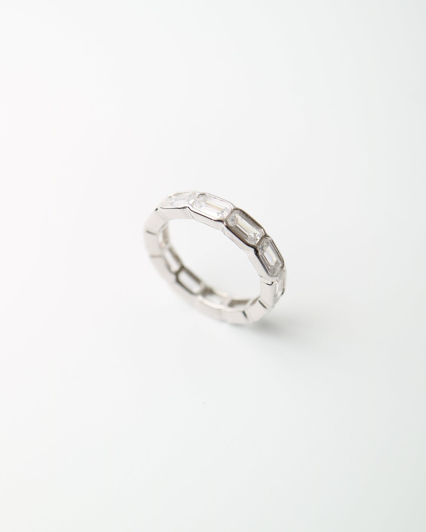 The Prism Eternity Band with baguette cut moissanite
