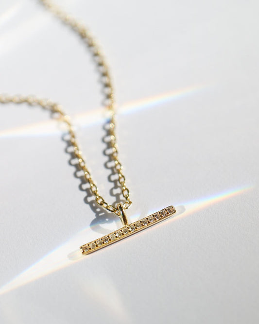 Axis Pendant in S925 sterling silver with 14kt gold plating and CZ t-bar