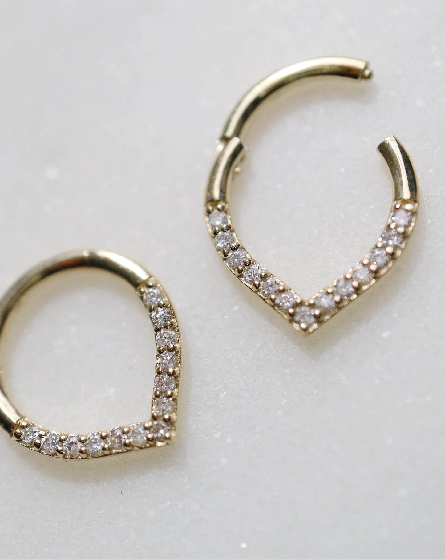 Diamond and gold daith piercings