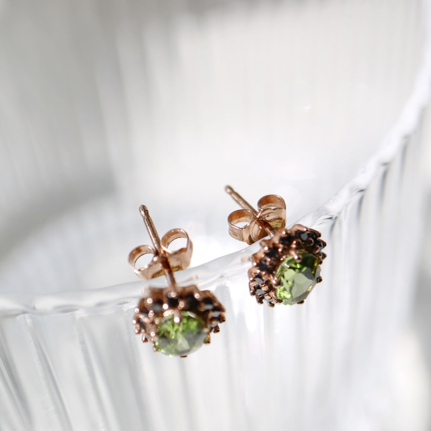 9ct rose gold earrings with peridot and black diamonds