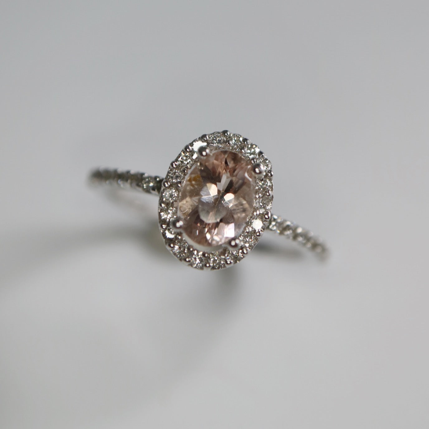 9kt white gold halo ring with Morganite and Diamonds