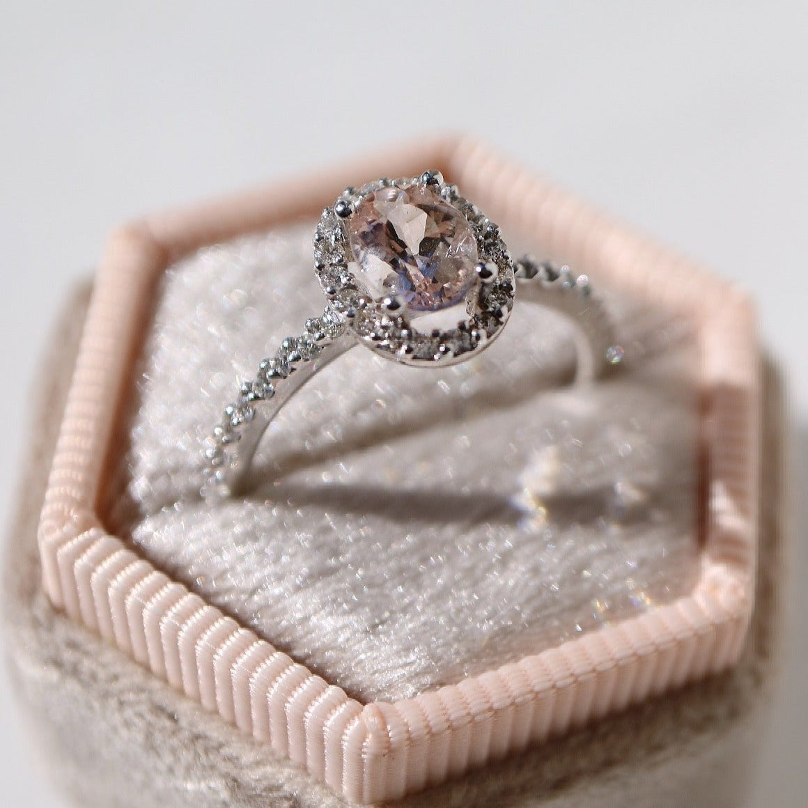 9kt white gold, morganite and diamond halo engagement ring