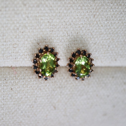 9kt rose gold earrings with peridot and black diamond halo
