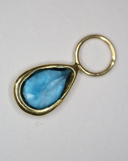 9ct gold charm with london blue topaz