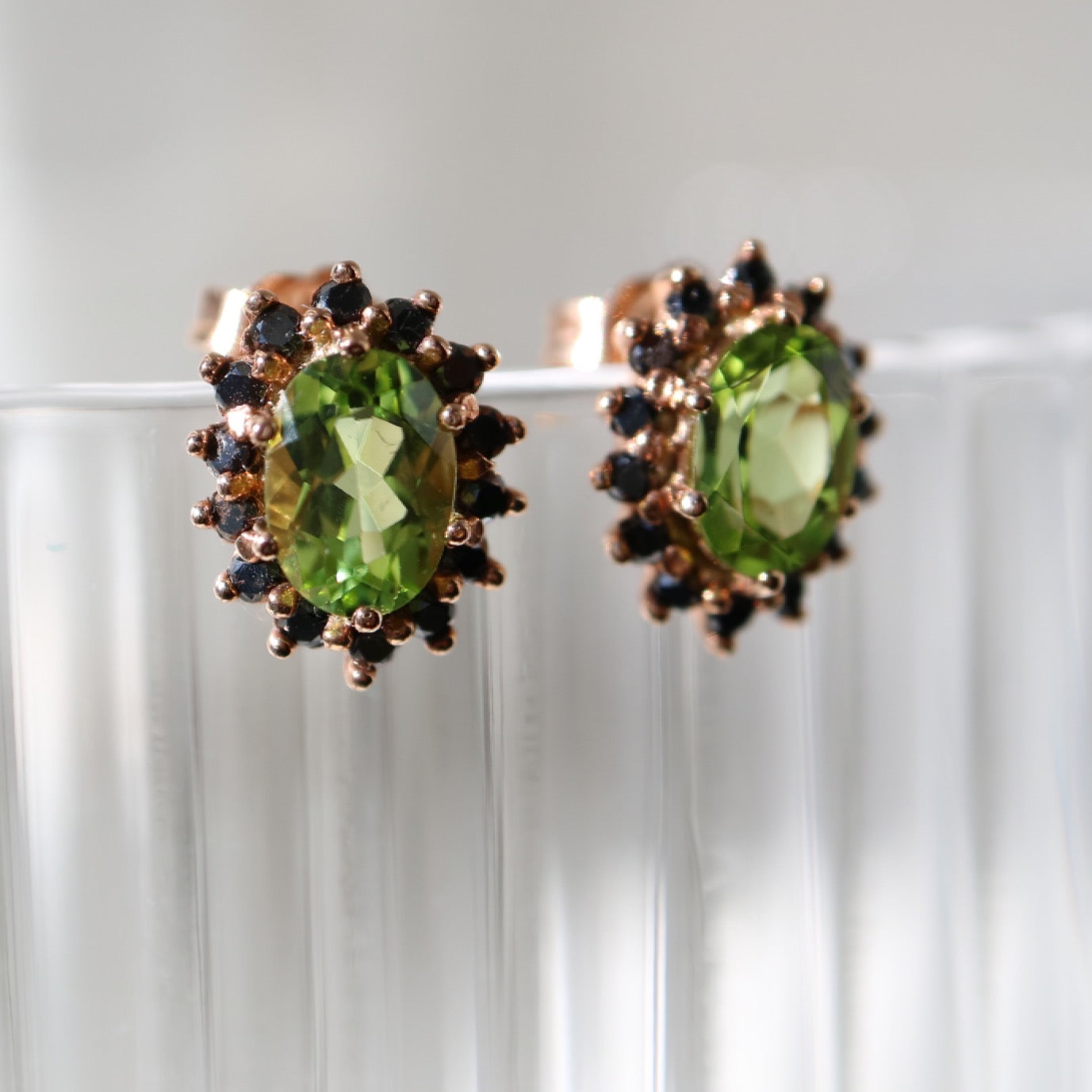 9kt rose gold earrings with peridot and black diamonds