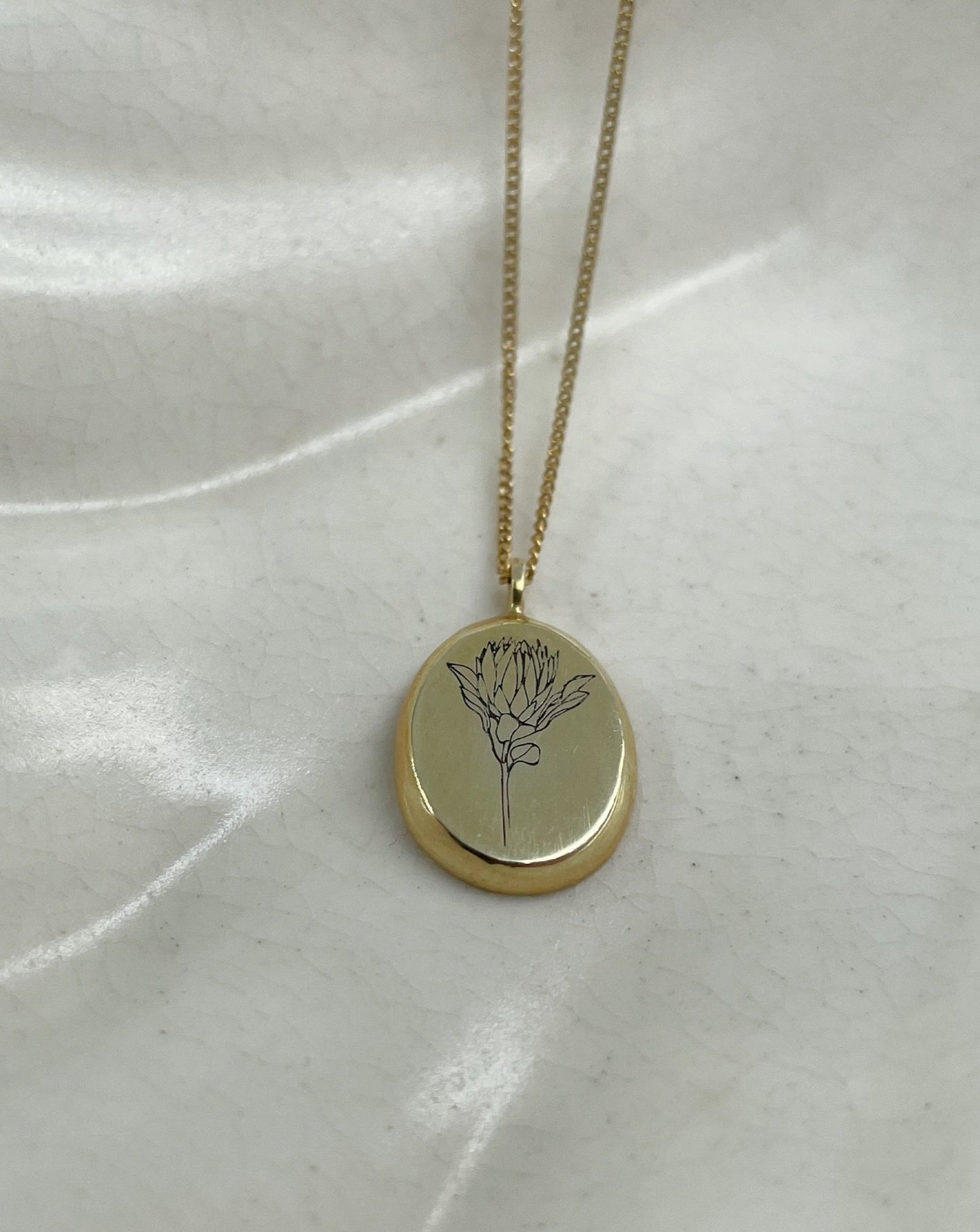 9ct gold Oval Protea Necklace from Meraki Jewellery Design