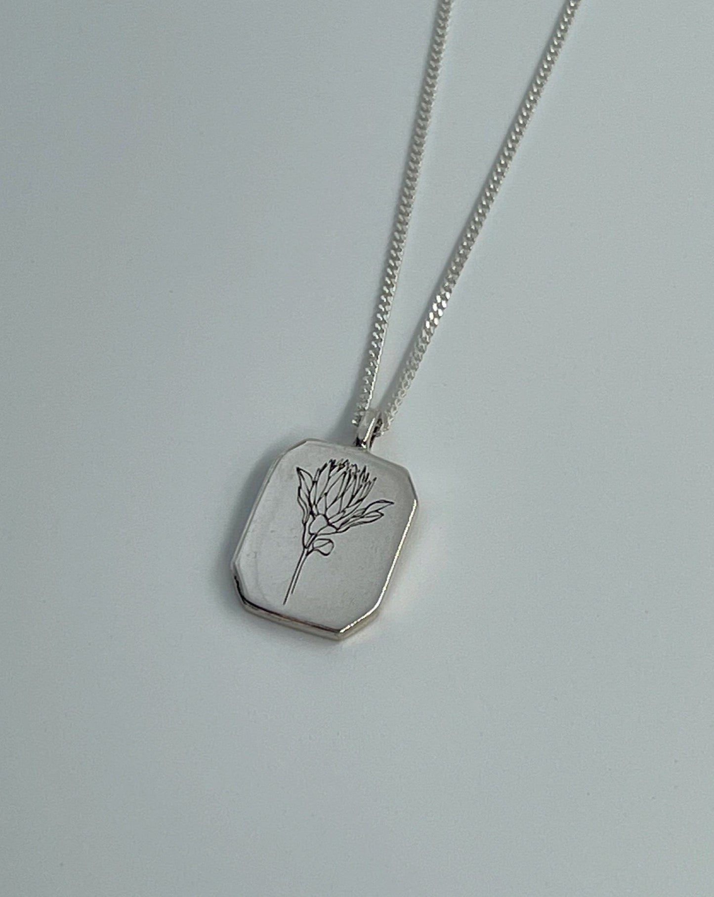 Silver Rectangle Protea pendant on white