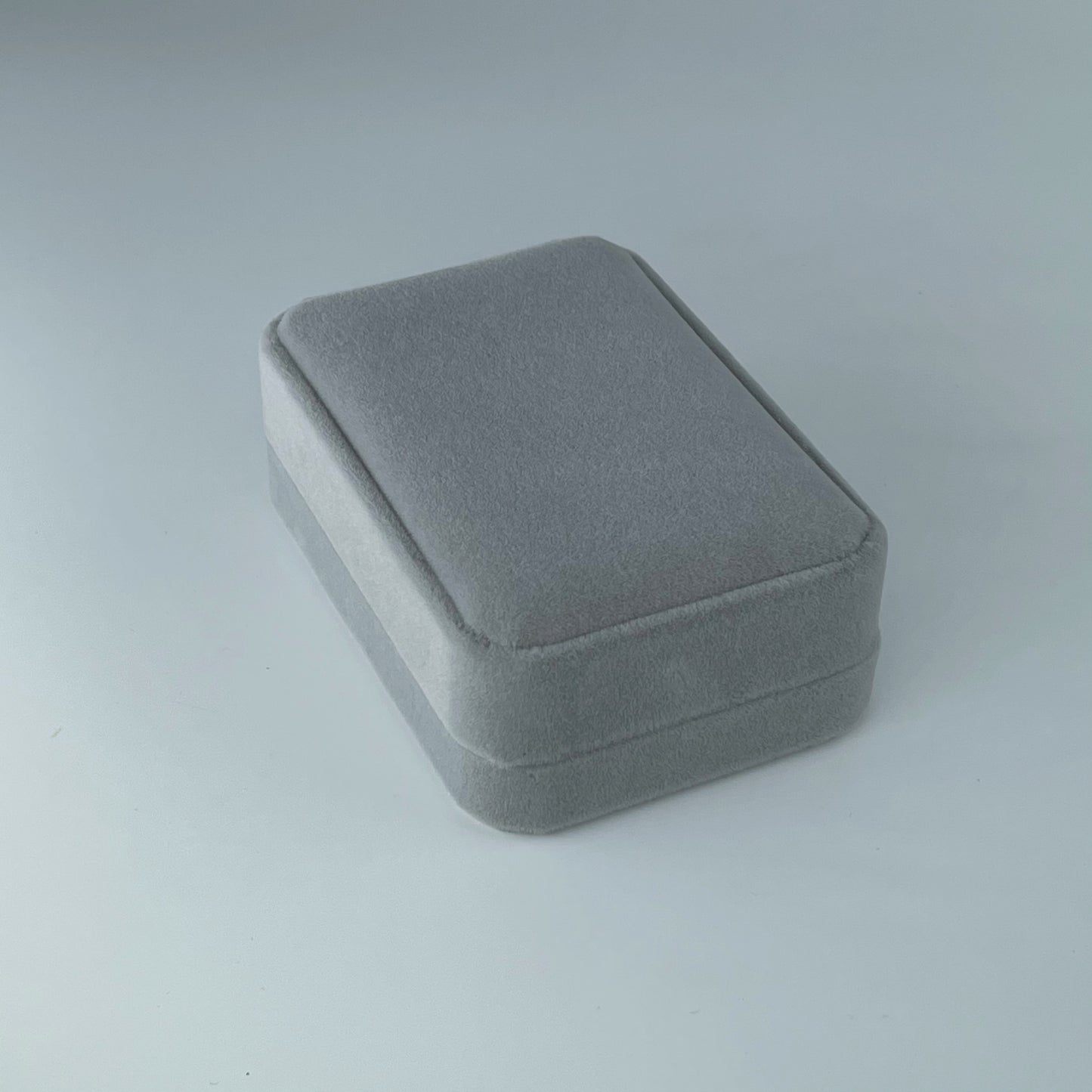 Grey velvet necklace box, closed lid