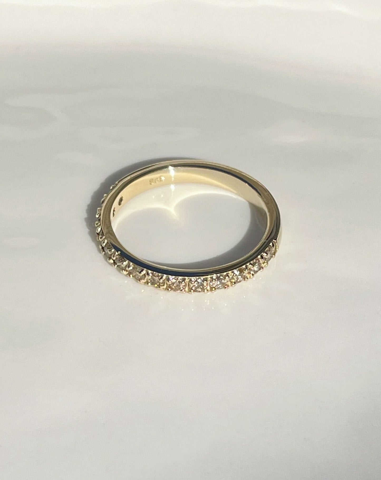 Collective & Co. 9ct gold and diamonds half eternity ring