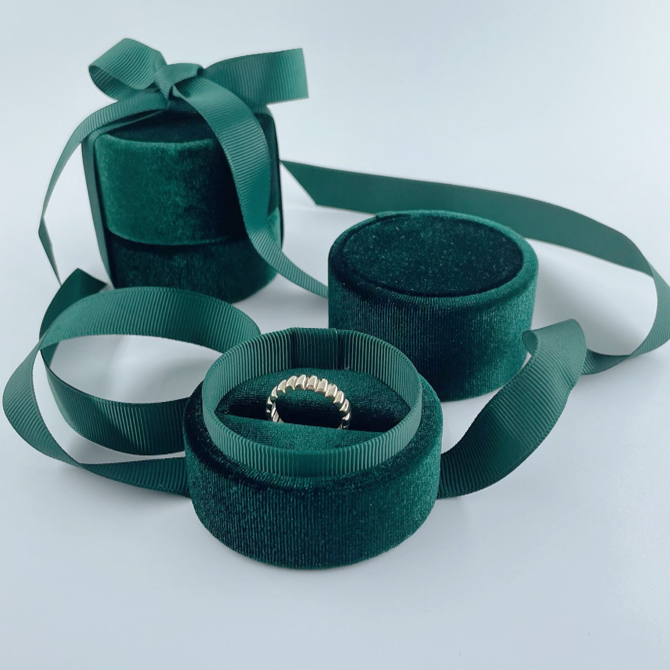 Green velvet ring boxes