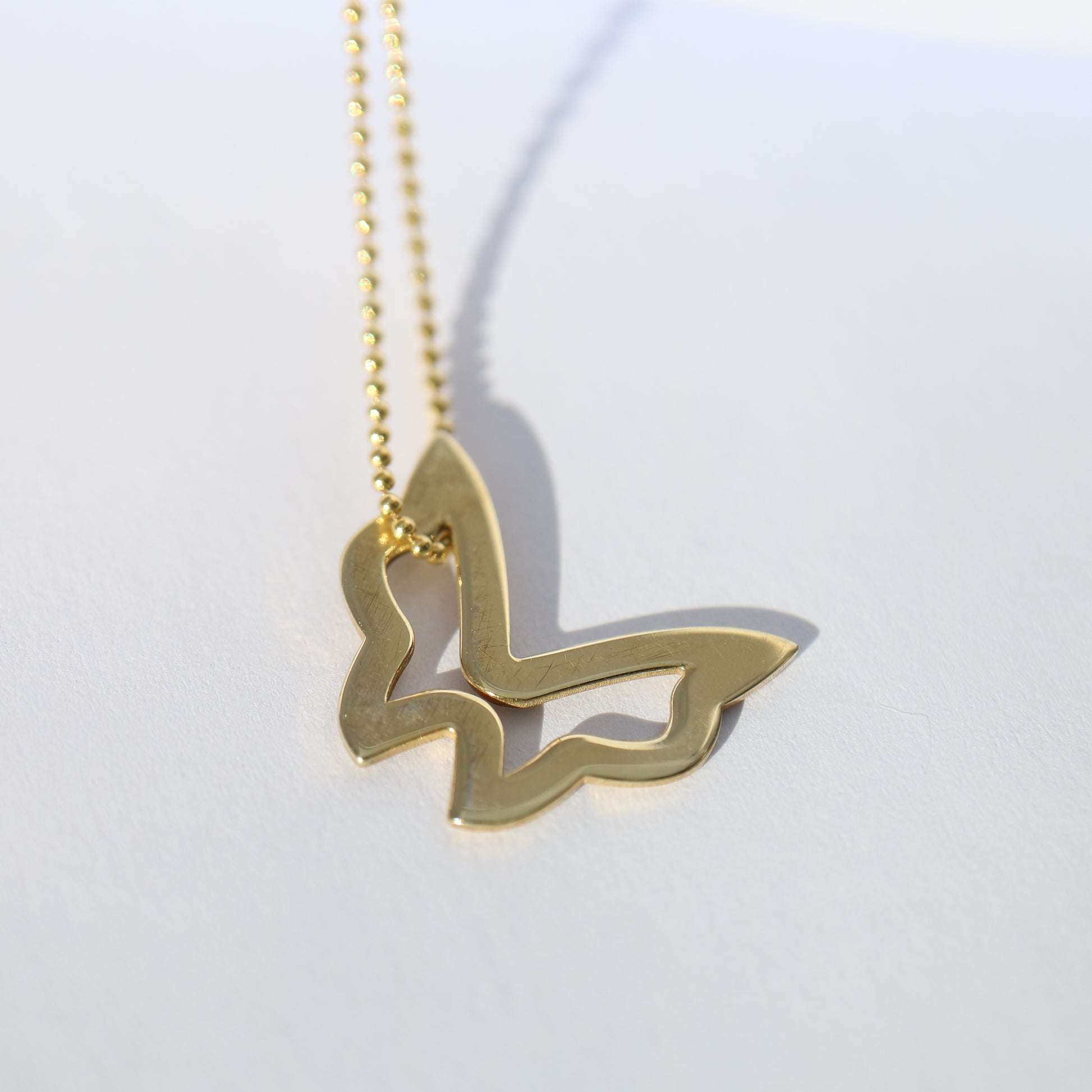 Gold Enamel Butterfly Pendant from Emme and Opal Jewellery