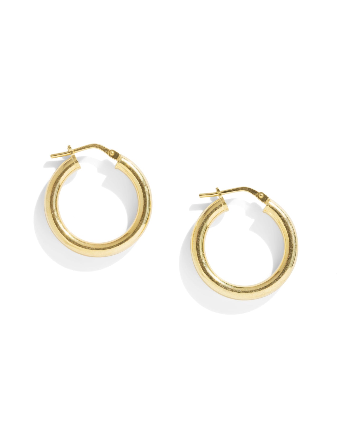 Gold Hoop Earrings on White