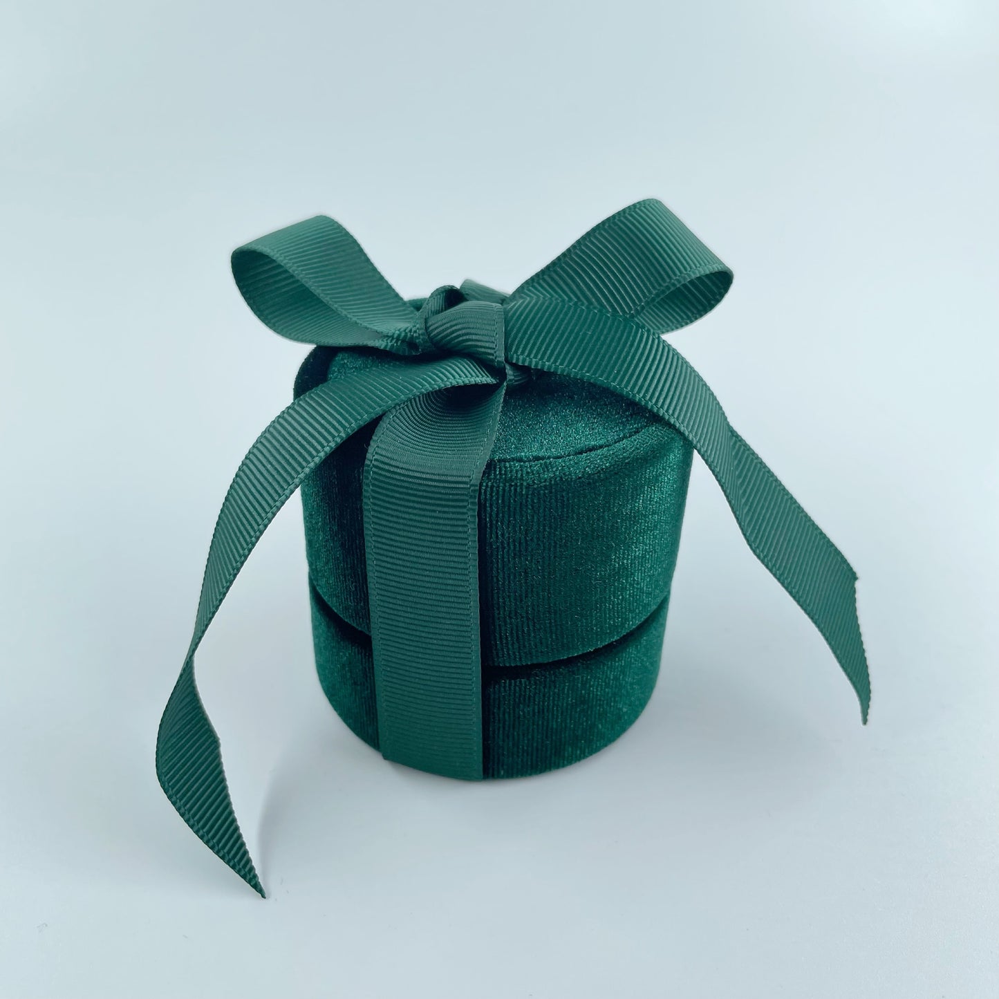 green velvet ring box with ribbon