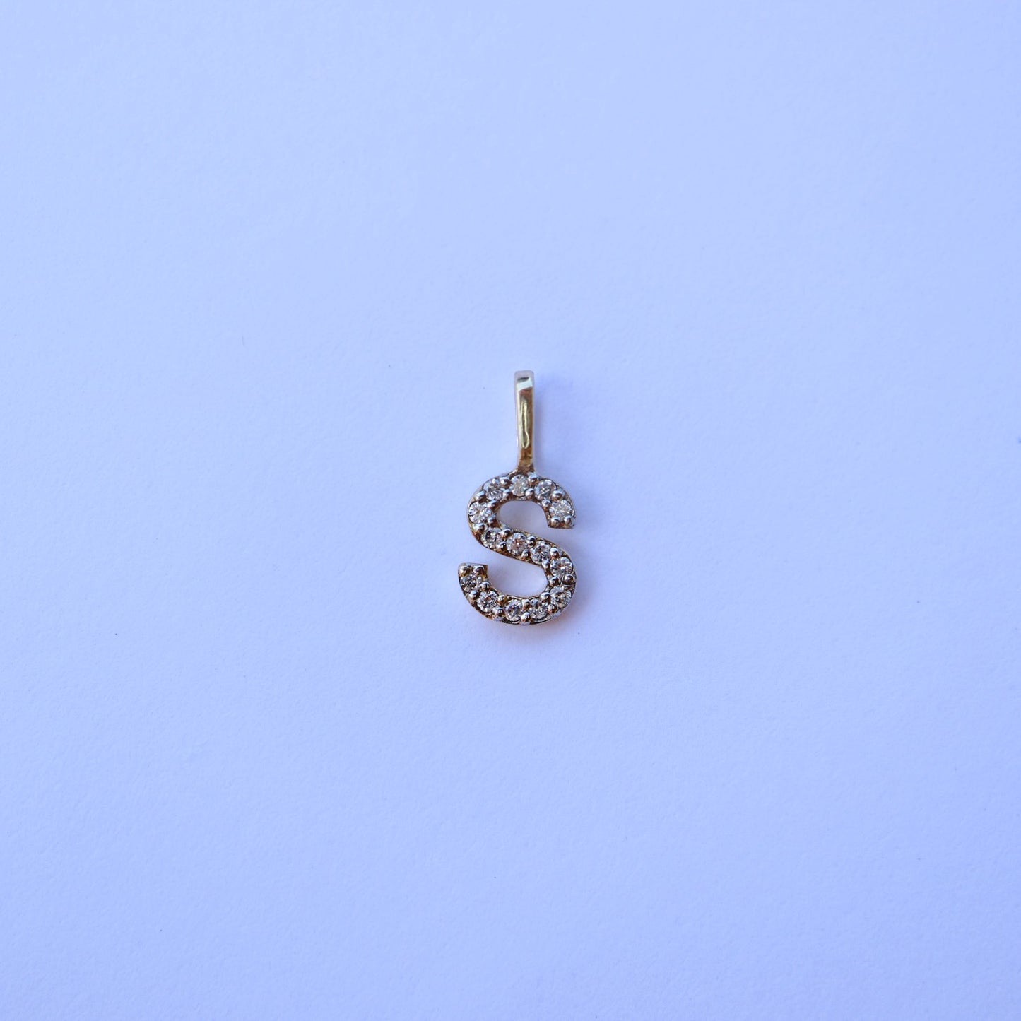 9kt gold and diamond initial pendants by Collective & Co.