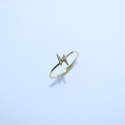Gold ring with diamond lightning bolt 