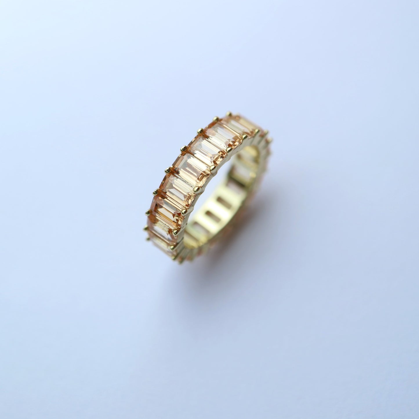 Baguette cut stones set in eternity ring band