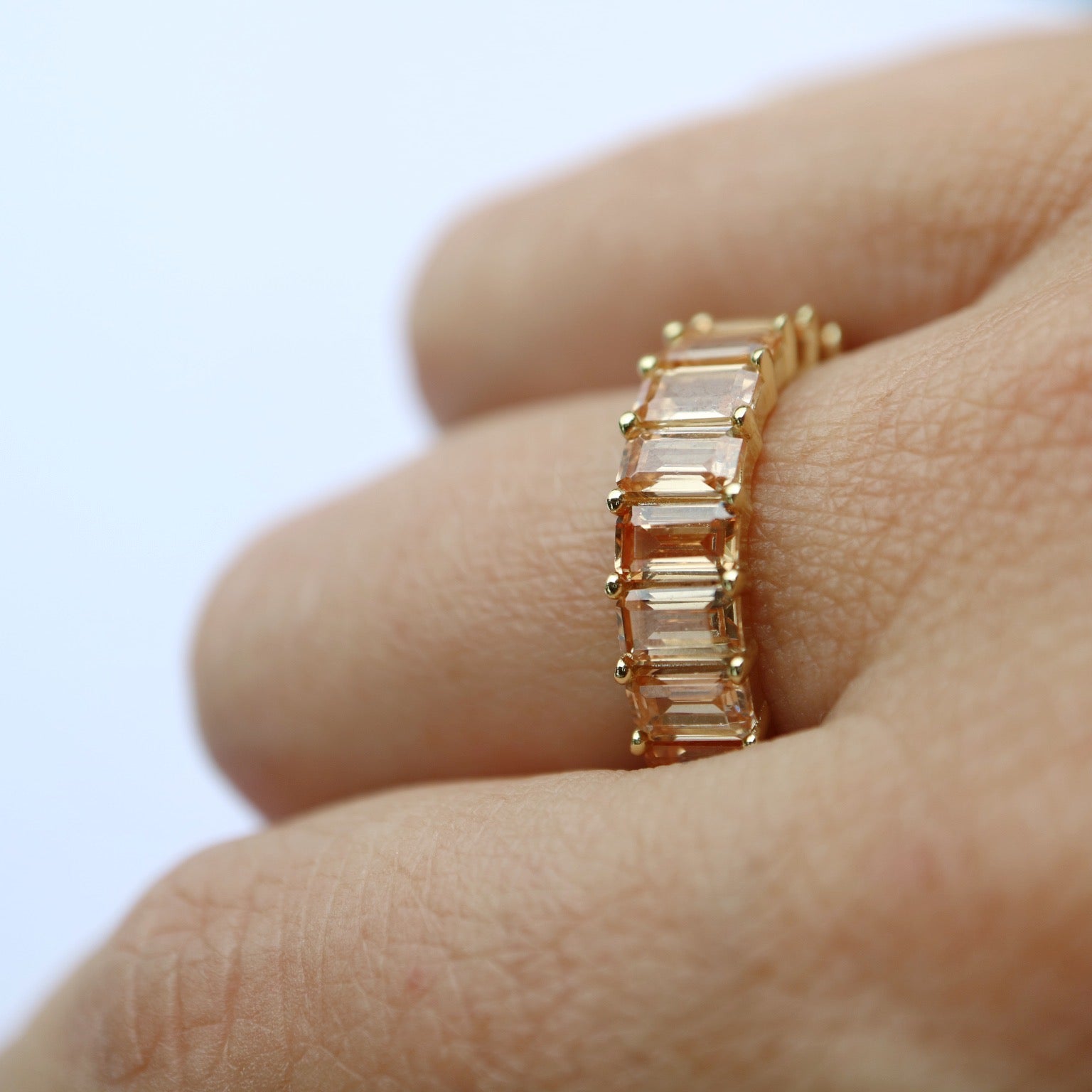 Baguette cut stones set in eternity ring band