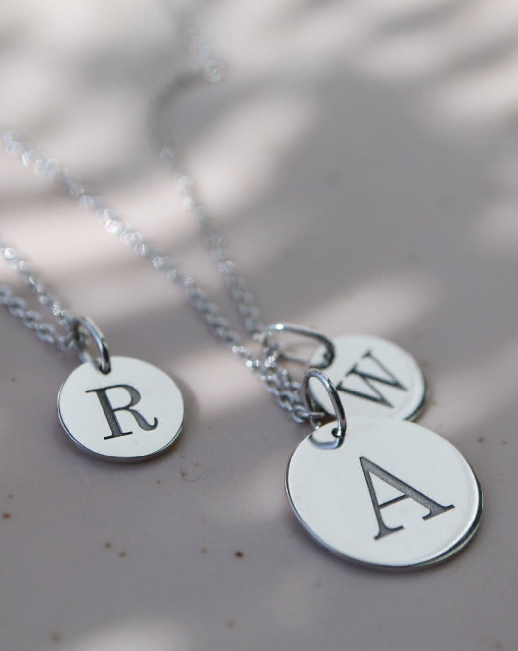 White Gold Initial Disc Pendants