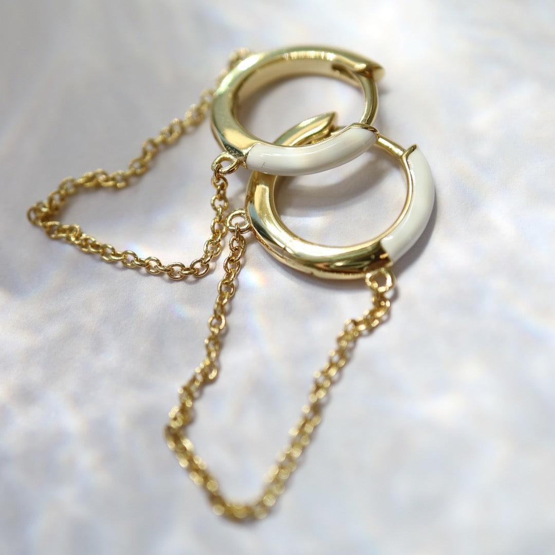 Gold hoops with white enamel