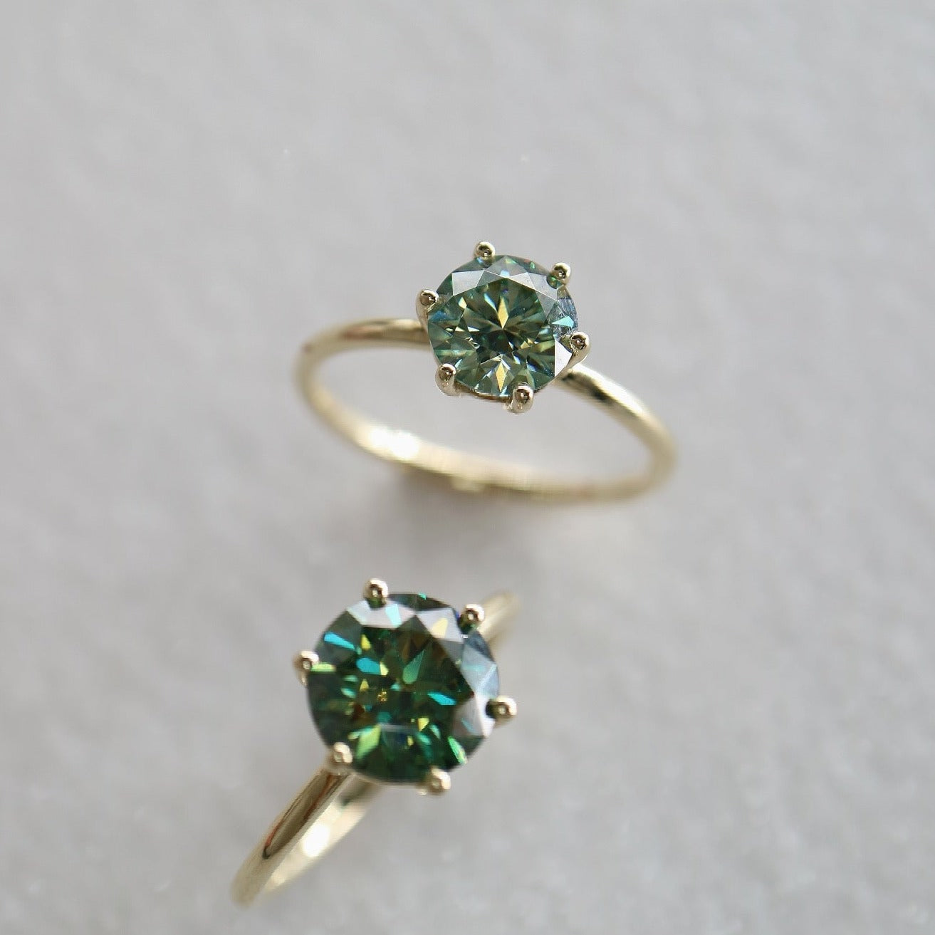 Solid 9ct gold and blue moissanite rings