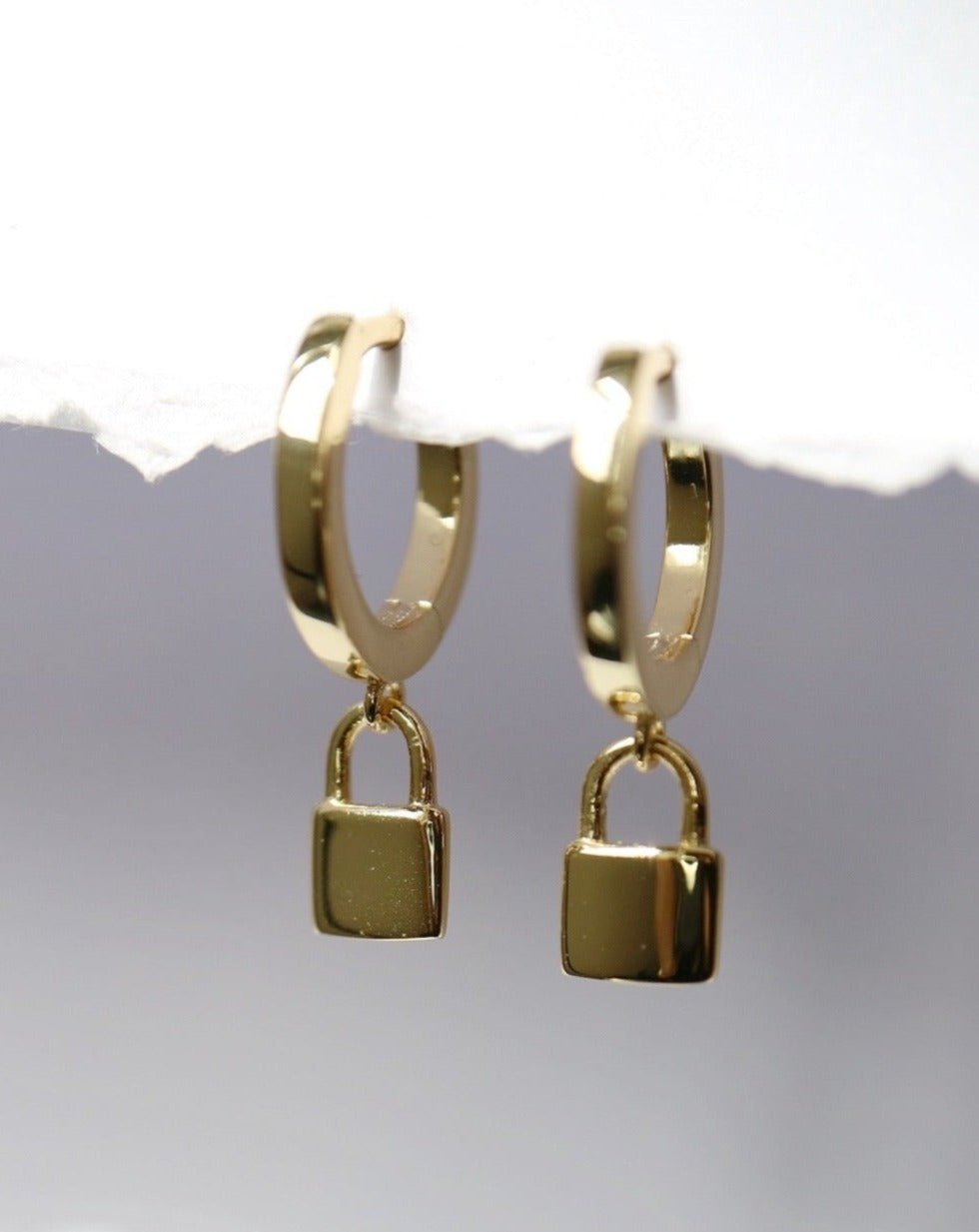 Lock Me In Huggie Earrings from Kini Jewels