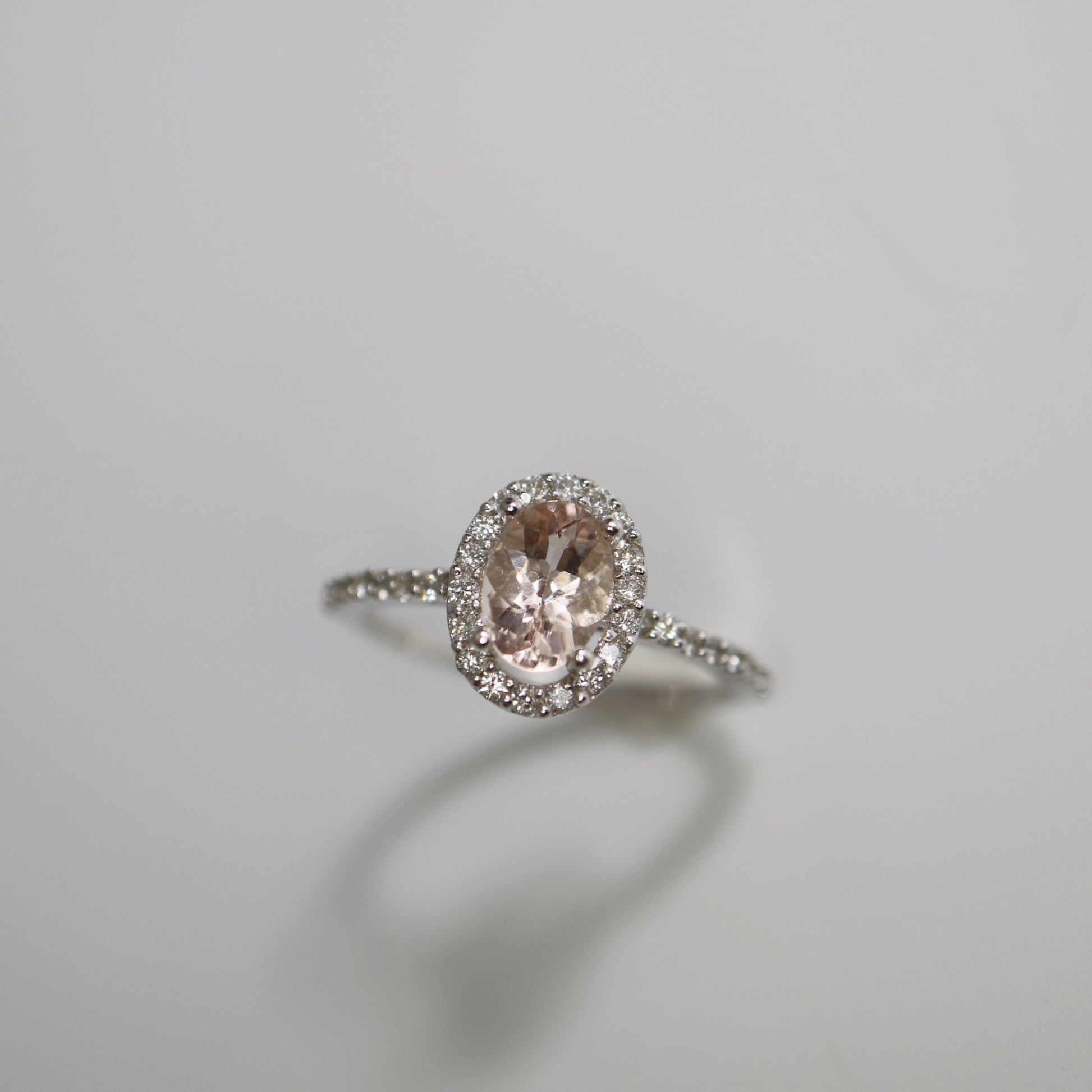 9kt white gold halo ring with Morganite and Diamonds