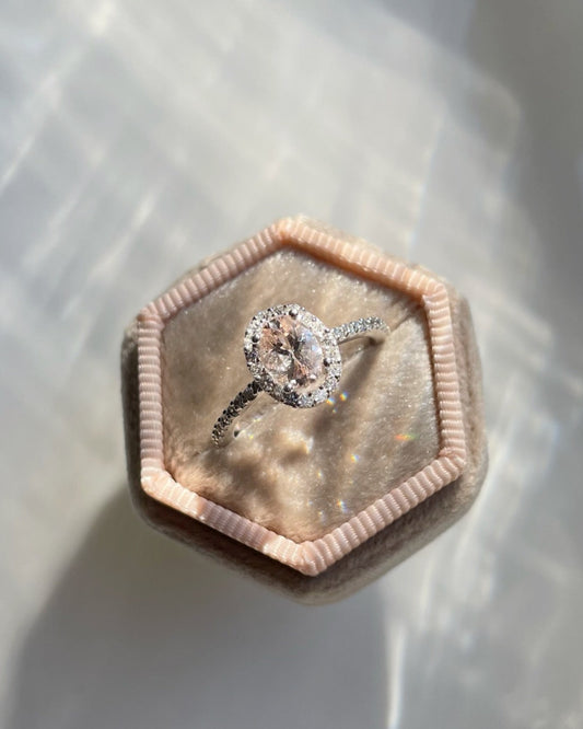 9ct white gold, morganite and diamond halo engagement ring