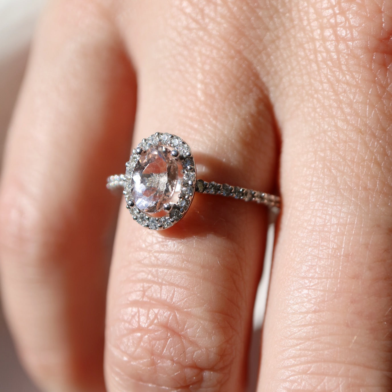 9ct white gold, morganite and diamond halo engagement ring
