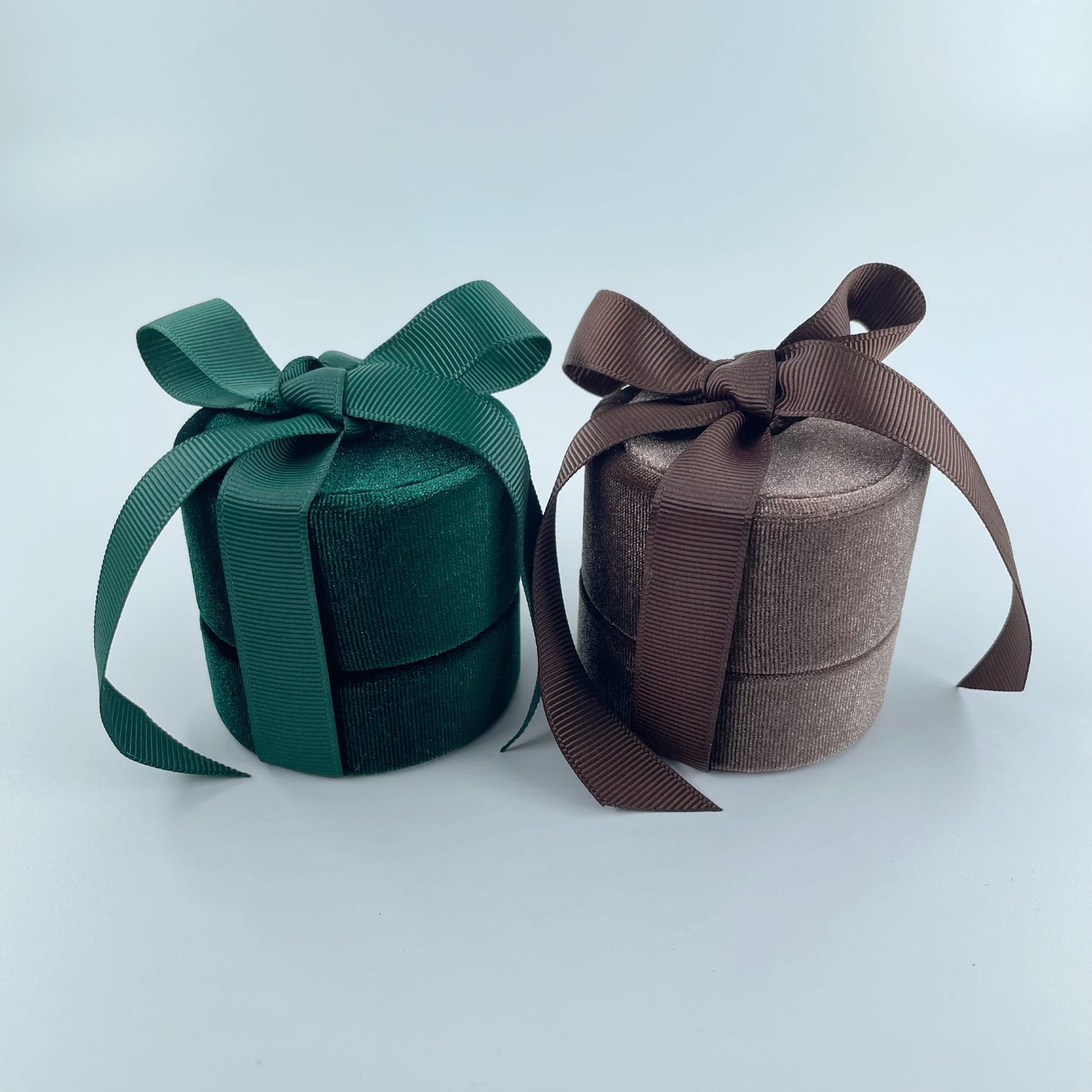 Green and brown velvet ring boxes