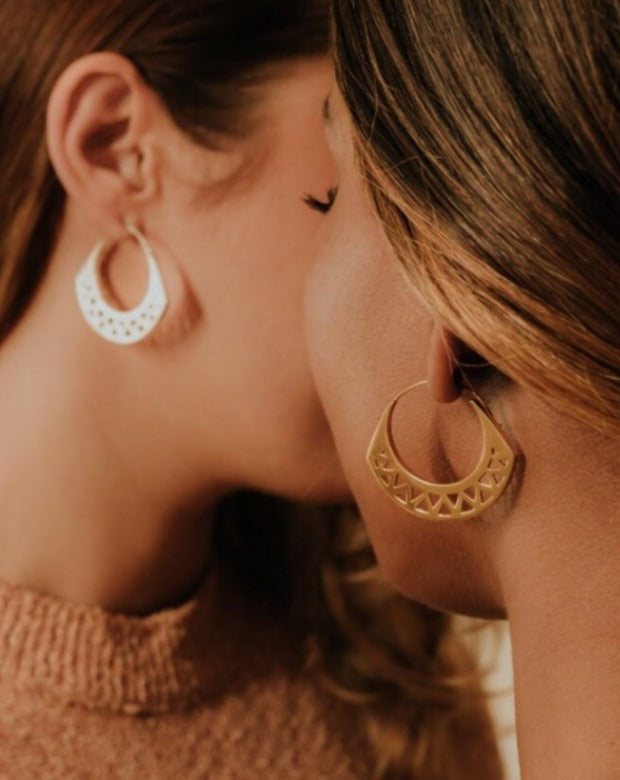 Silver and Gold Plated statement earrings on models