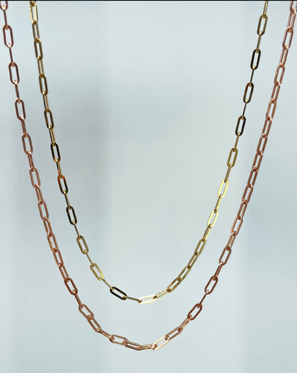 Yellow and rose gold paperclip chains layered