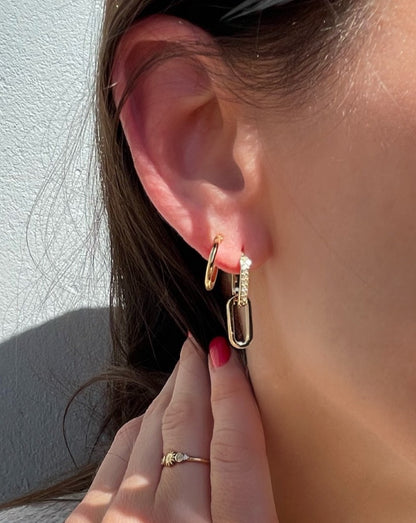 woman wearing hoop earrings