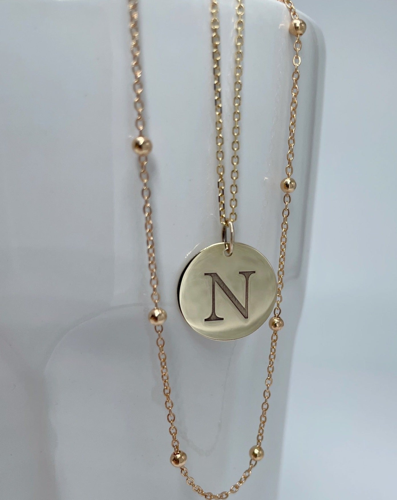 Two 9kt gold necklaces from Collective & Co online jewellery store